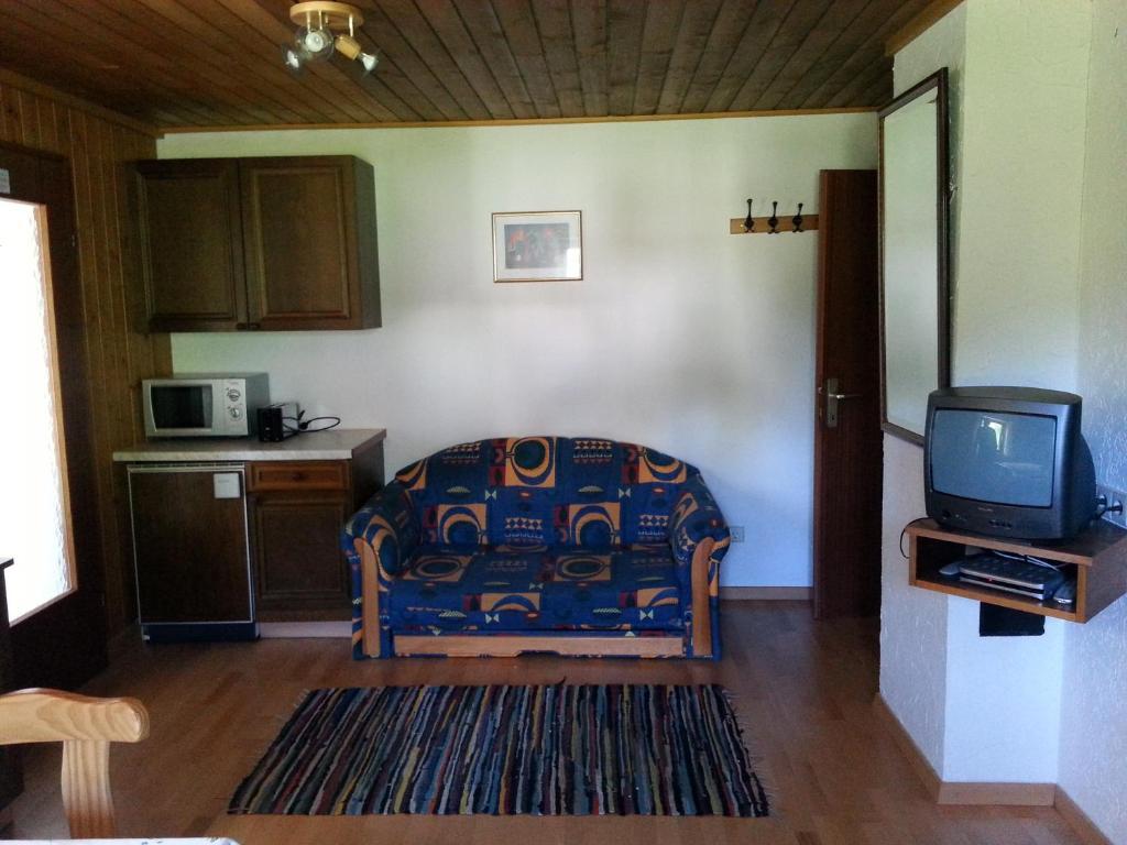 Fichtenblockhuette Sonnenalpe Nassfeld Cameră foto